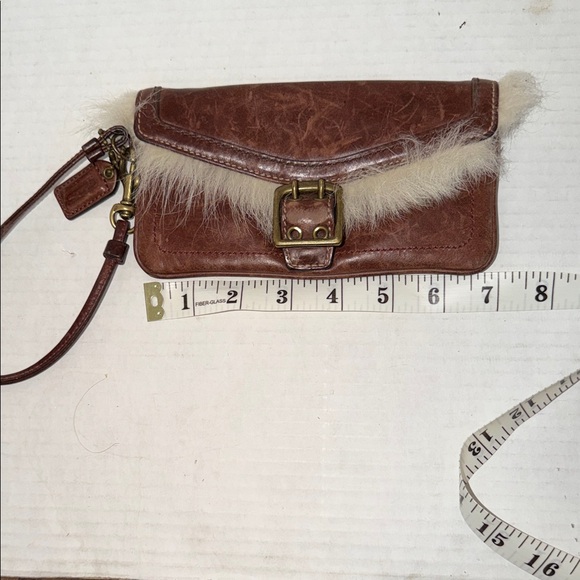 Coach Shearling Galaxy Chestnut Brown
Leather Buckle Wristlet Wallet - Picture 7 of 8